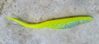 bait plastic lure with neon yellow body that glows in the dark and silver belly