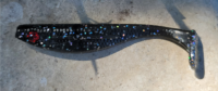 Bait plastic glow in the dark lure with shimmery glitter. Fishing lures with red eyes attract fish.